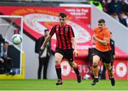 6 May 2023; Jack Cronin of Cherry Orchard FC in action against Karl Hearns of St Kevin's FC during the FAI Under 17 Cup Final 2022/23 match between Cherry Orchard FC and St Kevin’s Boys FC at Richmond Park in Dublin. Photo by Tyler Miller/Sportsfile