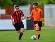 6 May 2023; Sean Curran of St Kevin's FC in action against Sean Doherty of Cherry Orchard FC during the FAI Under 17 Cup Final 2022/23 match between Cherry Orchard FC and St Kevin’s Boys FC at Richmond Park in Dublin. Photo by Tyler Miller/Sportsfile