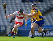 6 May 2023; Eamon Cassidy of Derry is tackled by Mikey Lohan of Roscommon during the GAA Hurling All-Ireland U20 B Championship Final match between Derry and Roscommon at Croke Park in Dublin. Photo by Ray McManus/Sportsfile