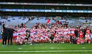 6 May 2023; The Derry players and management celebrate with the Richie McElligott Cup after the GAA Hurling All-Ireland U20 B Championship Final match between Derry and Roscommon at Croke Park in Dublin. Photo by Ray McManus/Sportsfile
