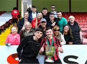 6 May 2023; Ger Crawley of Cherry Orchard FC has a photograph taken with his family and cup after the FAI Under 17 Cup Final 2022/23 match between Cherry Orchard FC and St Kevin’s Boys FC at Richmond Park in Dublin. Photo by Tyler Miller/Sportsfile