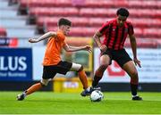 6 May 2023; Sam Dunne of St Kevin's FC in action against Josh Okagbue of Cherry Orchard FC during the FAI Under 17 Cup Final 2022/23 match between Cherry Orchard FC and St Kevin’s Boys FC at Richmond Park in Dublin. Photo by Tyler Miller/Sportsfile