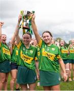 6 May 2023; Joint captains Ciara O'Sullivan, left and Emma Conway of Kerry lift the cup after the Electric Ireland Minor C All-Ireland Championship Final match between Down and Kerry at Clane GAA in Kildare. Photo by Stephen Marken/Sportsfile