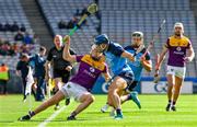 6 May 2023; Rory O'Connor of Wexford is tackled by Eoghan O'Donnell of Dublin during the Leinster GAA Hurling Senior Championship Round 3 match between Dublin and Wexford at Croke Park in Dublin. Photo by Ray McManus/Sportsfile
