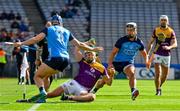 6 May 2023; Rory O'Connor of Wexford is tackled by Eoghan O'Donnell of Dublin during the Leinster GAA Hurling Senior Championship Round 3 match between Dublin and Wexford at Croke Park in Dublin. Photo by Ray McManus/Sportsfile