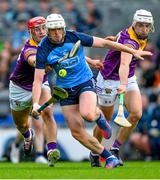 6 May 2023; Conor Donohoe of Dublin is tackled by Lee Chin, left, and Rory O'Connor of Wexford during the Leinster GAA Hurling Senior Championship Round 3 match between Dublin and Wexford at Croke Park in Dublin. Photo by Ray McManus/Sportsfile