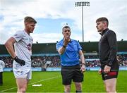 6 May 2023; Referee Thomas Murphy performs the coin toss in the company of team captains Shane Farrell of Kildare, left, and Ryan Magill of Down before the Eirgrid GAA Football All-Ireland U20 Championship Semi-Final match between Kildare and Down at Parnell Park in Dublin. Photo by Tyler Miller/Sportsfile