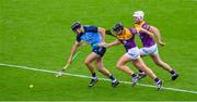 6 May 2023; Danny Sutcliffe of Dublin is tackled by Wexford players Liam Óg McGovern and Oisin Foley, right, during the Leinster GAA Hurling Senior Championship Round 3 match between Dublin and Wexford at Croke Park in Dublin. Photo by Ray McManus/Sportsfile