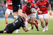 6 May 2023; Diarmuid Barron of Munster is tackled by Jack Dempsey of Glasgow Warriors during the United Rugby Championship Quarter-Final match between Glasgow Warriors and Munster at Scotstoun Stadium in Glasgow, Scotland. Photo by Paul Devlin/Sportsfile