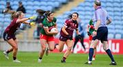 7 May 2023; Rachel Kearns of Mayo in action against Ailbhe Davoren, left, and Charlotte Cooney of Galway and under the watchful eyes of referee Brendan Cawley during the TG4 Ladies Connacht Senior Football Championship Final between Mayo and Galway at Hastings Insurance MacHale Park in Castlebar, Mayo. Photo by Ray McManus/Sportsfile