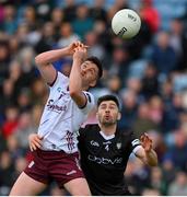 7 May 2023; Ian Burke of Galway is tackled by Nathan Mullen  of Sligo during the Connacht GAA Football Senior Championship Final match between Sligo and Galway at Hastings Insurance MacHale Park in Castlebar, Mayo. Photo by Ray McManus/Sportsfile