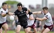 7 May 2023; Darragh Cummins of Sligo is tackled by Damien Comer, left, and John Daly of Galway during the Connacht GAA Football Senior Championship Final match between Sligo and Galway at Hastings Insurance MacHale Park in Castlebar, Mayo. Photo by Brendan Moran/Sportsfile