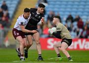 7 May 2023; Sligo goalkeeper Daniel Lyons wins possession as  Ian Burke of Galway is tackled by Nathan Mullen  of Sligo during the Connacht GAA Football Senior Championship Final match between Sligo and Galway at Hastings Insurance MacHale Park in Castlebar, Mayo. Photo by Ray McManus/Sportsfile