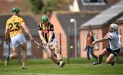 7 May 2023; Martin Keoghan of Kilkenny shoots to score his side's third goal past Antrim goalkeeper Ryan Elliott during the Leinster GAA Hurling Senior Championship Round 3 match between Antrim and Kilkenny at Corrigan Park in Belfast. Photo by Ramsey Cardy/Sportsfile