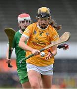 7 May 2023; Shannagh Heggarty of Antrim in action against Niamh Brennan of Limerick during the Electric Ireland Minor A Shield All-Ireland Championship Final match between Antrim and Limerick at UPMC Nowlan Park in Kilkenny. Photo by Stephen Marken/Sportsfile