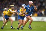 7 May 2023; Lucy Conroy of Laois in action against Ruth Gannon, left, and Aideen O'Brien of Roscommon during the Electric Ireland Minor B All-Ireland Championship Final match between Laois and Roscommon at St. Brendan’s Park in Birr, Offaly. Photo by Tom Beary/Sportsfile