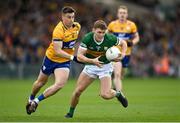 7 May 2023; Gavin White of Kerry in action against Jamie Malone of Clare during the Munster GAA Football Senior Championship Final match between Kerry and Clare at LIT Gaelic Grounds in Limerick. Photo by David Fitzgerald/Sportsfile