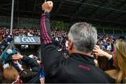 7 May 2023; Galway manager Padraic Joyce and his wife Tracey celebrate as their son Charlie Joyce lifts the Nestor Cup on the podium after Galway captain Seán Kelly, 3, had done so after the Connacht GAA Football Senior Championship Final match between Sligo and Galway at Hastings Insurance MacHale Park in Castlebar, Mayo. Photo by Brendan Moran/Sportsfile