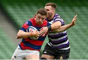 7 May 2023; Michael Brown of Clontarf is tackled by Matthew Caffrey of Terenure during the Energia All-Ireland League Men's Division 1A Final match between Clontarf and Terenure at the Aviva Stadium in Dublin. Photo by Harry Murphy/Sportsfile