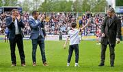 7 May 2023; Charlie Joyce, son of Galway manager Padraic Joyce, reacts to the crowd's applause as he stands beside members of the 1998 Galway Connacht championship winning team, from left, Tommy Joyce, Derek Savage and Niall Finnegan, before the Connacht GAA Football Senior Championship Final match between Sligo and Galway at Hastings Insurance MacHale Park in Castlebar, Mayo. Photo by Brendan Moran/Sportsfile