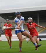 7 May 2023; Bevin Bowdern of Waterford in action against Ellen Crowley of Cork during the Electric Ireland Minor A All-Ireland Championship Final match between Cork and Waterford at UPMC Nowlan Park in Kilkenny. Photo by Stephen Marken/Sportsfile