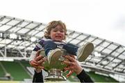 7 May 2023; Harry Hamilton is lifted in the trophy by his father Mark after the Energia All-Ireland League Men's Division 1A Final match between Clontarf and Terenure at the Aviva Stadium in Dublin. Photo by Harry Murphy/Sportsfile