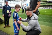 6 May 2023; Match day mascot Leo Kilduff with Robbie Henshaw of Leinster before the United Rugby Championship Quarter-Final between Leinster and Cell C Sharks at the Aviva Stadium in Dublin. Photo by Harry Murphy/Sportsfile