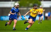 7 May 2023; Lilly Murray of Roscommon in action against Aoife Gee of Laois during the Electric Ireland Minor B All-Ireland Championship Final match between Laois and Roscommon at St. Brendan’s Park in Birr, Offaly. Photo by Tom Beary/Sportsfile