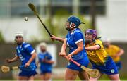 7 May 2023; Annabelle Ryan of Laois in action against Siofra Hession of Roscommon during the Electric Ireland Minor B All-Ireland Championship Final match between Laois and Roscommon at St. Brendan’s Park in Birr, Offaly. Photo by Tom Beary/Sportsfile