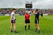 7 May 2023; Referee Brendan Cawley performs the coin toss in the company of team captains Seán Kelly, left, and Niall Murphy of Sligo before the Connacht GAA Football Senior Championship Final match between Sligo and Galway at Hastings Insurance MacHale Park in Castlebar, Mayo. Photo by Brendan Moran/Sportsfile