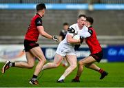 6 May 2023; James McGrath of Kildare is tackled by Fiachra McEvoy of Down during the Eirgrid GAA Football All-Ireland U20 Championship Semi-Final match between Kildare and Down at Parnell Park in Dublin. Photo by Tyler Miller/Sportsfile