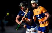 8 May 2023; Eddie Ryan of Tipperary in action against Oran Cahill of Clare during the oneills.com Munster GAA Hurling U20 Championship Semi Final match between Tipperary and Clare at FBD Semple Stadium in Thurles, Tipperary. Photo by Tom Beary/Sportsfile