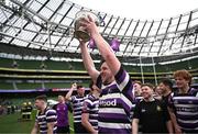 7 May 2023; Adam Melia of Terenure celebrates with the trophy after his side's victory in the Energia All-Ireland League Men's Division 1A Final match between Clontarf and Terenure at the Aviva Stadium in Dublin. Photo by Harry Murphy/Sportsfile