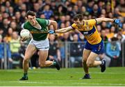 7 May 2023; David Clifford of Kerry in action against Ciaran Russell of Clare during the Munster GAA Football Senior Championship Final match between Kerry and Clare at LIT Gaelic Grounds in Limerick. Photo by David Fitzgerald/Sportsfile