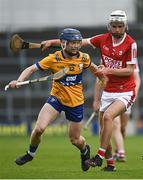 9 May 2023; Sean Arthur of Clare in action against Carthaigh Cronin of Cork during the 2023 Electric Ireland Munster GAA Hurling Minor Championship Final  match between Cork and Clare at FBD Semple Stadium in Thurles, Tipperary. Photo by Harry Murphy/Sportsfile