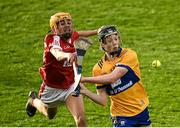 9 May 2023; Michael Collins of Clare in action against Johnny Murphy of Cork during the 2023 Electric Ireland Munster GAA Hurling Minor Championship Final  match between Cork and Clare at FBD Semple Stadium in Thurles, Tipperary. Photo by Harry Murphy/Sportsfile