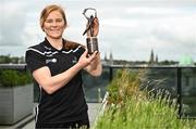 10 May 2023; PwC GPA Player of the Month for April in camogie, Beth Carton of Waterford, with her award at PwC’s offices in Cork. Photo by Eóin Noonan/Sportsfile