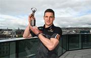 10 May 2023; PwC GAA/GPA Player of the Month for April in hurling, John Conlon of Clare, with his award at PwC’s offices in Cork. Photo by Eóin Noonan/Sportsfile