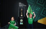 10 May 2023; Ruby, age 4, and Valerie O'Connor, age 7, with the FIFA Women’s World Cup trophy, part of the FIFA Women’s World Cup Trophy Tour in Dublin, at The Mansion House. The FIFA Women’s World Cup Trophy Tour began in February and is visiting all 32 of the tournament’s participating nations – more countries than ever before! The tour is ‘Going Beyond’ to inspire people of all ages to get excited about the FIFA Women’s World Cup Australia & New Zealand 2023. Photo by Stephen McCarthy/Sportsfile