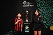 10 May 2023; Bohemians supporters and sisters Grace, age 10, left, and Lauren Ramsbottom, age 12, with the FIFA Women’s World Cup trophy, part of the FIFA Women’s World Cup Trophy Tour in Dublin, at The Mansion House. The FIFA Women’s World Cup Trophy Tour began in February and is visiting all 32 of the tournament’s participating nations – more countries than ever before! The tour is ‘Going Beyond’ to inspire people of all ages to get excited about the FIFA Women’s World Cup Australia & New Zealand 2023. Photo by Stephen McCarthy/Sportsfile