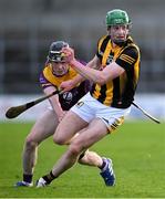 10 May 2023; Luke Connellan of Kilkenny in action against Corey Byrne Dunbar of Wexford during the oneills.com Leinster GAA Hurling U20 Championship Semi-Final match between Kilkenny and Wexford at UPMC Nowlan Park in Kilkenny. Photo by David Fitzgerald/Sportsfile