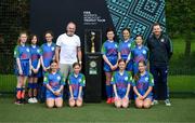 10 May 2023; Trevor Mallard, ambassador of New Zealand to Ireland, with St Matthew's National School, Sandymount, and the FIFA Women’s World Cup trophy during a grassroots girls schools blitz, part of the FIFA Women’s World Cup Trophy Tour in Dublin, at Irishtown Stadium in Dublin. The FIFA Women’s World Cup Trophy Tour began in February and is visiting all 32 of the tournament’s participating nations – more countries than ever before! The tour is ‘Going Beyond’ to inspire people of all ages to get excited about the FIFA Women’s World Cup Australia & New Zealand 2023. Photo by Stephen McCarthy/Sportsfile