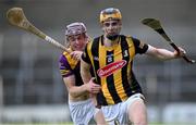 10 May 2023; Billy Reid of Kilkenny in action against Michael Dundon of Wexford during the oneills.com Leinster GAA Hurling U20 Championship Semi-Final match between Kilkenny and Wexford at UPMC Nowlan Park in Kilkenny. Photo by David Fitzgerald/Sportsfile