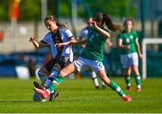 11 May 2023; Emma Memminger of Germany is tackled by Aoibhe Brennan of Republic of Ireland during the Women's U16 International Friendly match between Republic of Ireland and Germany at St Kevins FC in Dublin. Photo by Tyler Miller/Sportsfile
