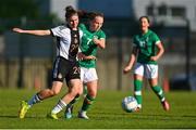 11 May 2023; Freya Healy of Republic of Ireland is tackled by Tessa Zimmerman of Germany during the Women's U16 International Friendly match between Republic of Ireland and Germany at St Kevins FC in Dublin. Photo by Tyler Miller/Sportsfile