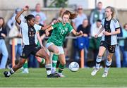 11 May 2023; Katie O'Reilly of Republic of Ireland in action against Franziska Mbuyi of Germany during the Women's U16 International Friendly match between Republic of Ireland and Germany at St Kevins FC in Dublin. Photo by Tyler Miller/Sportsfile