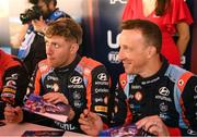11 May 2023; Kris Meeke and James Fulton, Hyundai i20 N, signing autographs before day one of the FIA World Rally Championship Portugal in Porto, Portugal. Photo by Philip Fitzpatrick/Sportsfile