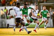 12 May 2023; Tunde Owolabi of Cork City in action against Wasiri Williams of Dundalk during the SSE Airtricity Men's Premier Division match between Dundalk and Cork City at Oriel Park in Dundalk, Louth. Photo by Ramsey Cardy/Sportsfile