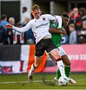 12 May 2023; Tunde Owolabi of Cork City is tackled by Hayden Muller of Dundalk during the SSE Airtricity Men's Premier Division match between Dundalk and Cork City at Oriel Park in Dundalk, Louth. Photo by Ramsey Cardy/Sportsfile