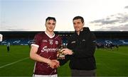 12 May 2023; Pictured is Aaron Niland of Galway, being presented with the Electric Ireland Player of the Match award by TG4 analyst Tom Kenny following his performance for Galway in today’s Electric Ireland Leinster Minor Hurling Championship Final versus Kilkenny at Laois Hire O’Moore Park in Portlaoise, Laois. Follow all the action in the Electric Ireland GAA Minor Championships on social media @ElectricIreland and via the hashtag #ThisIsMajor, or for more information go to https://www.electricireland.ie/gaa-minor-championships. Photo by Eóin Noonan/Sportsfile